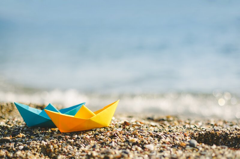 Origami Boats on Beach
