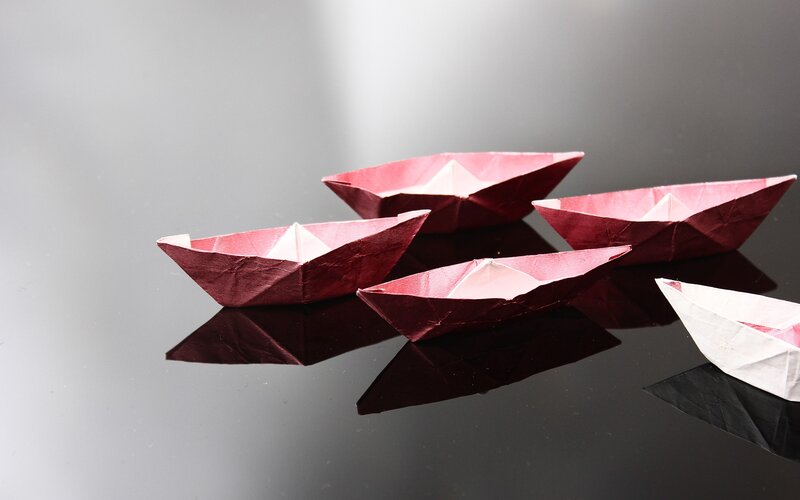Origami Boats on Surface — Red, Calm