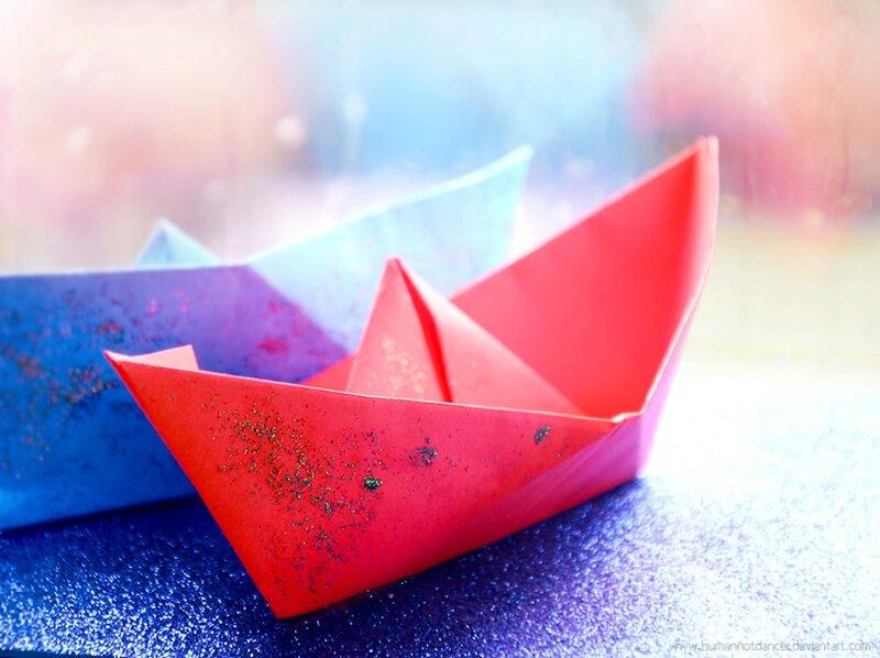 Origami Boats on Surface — Red