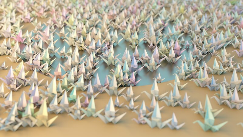 Origami cranes in a field