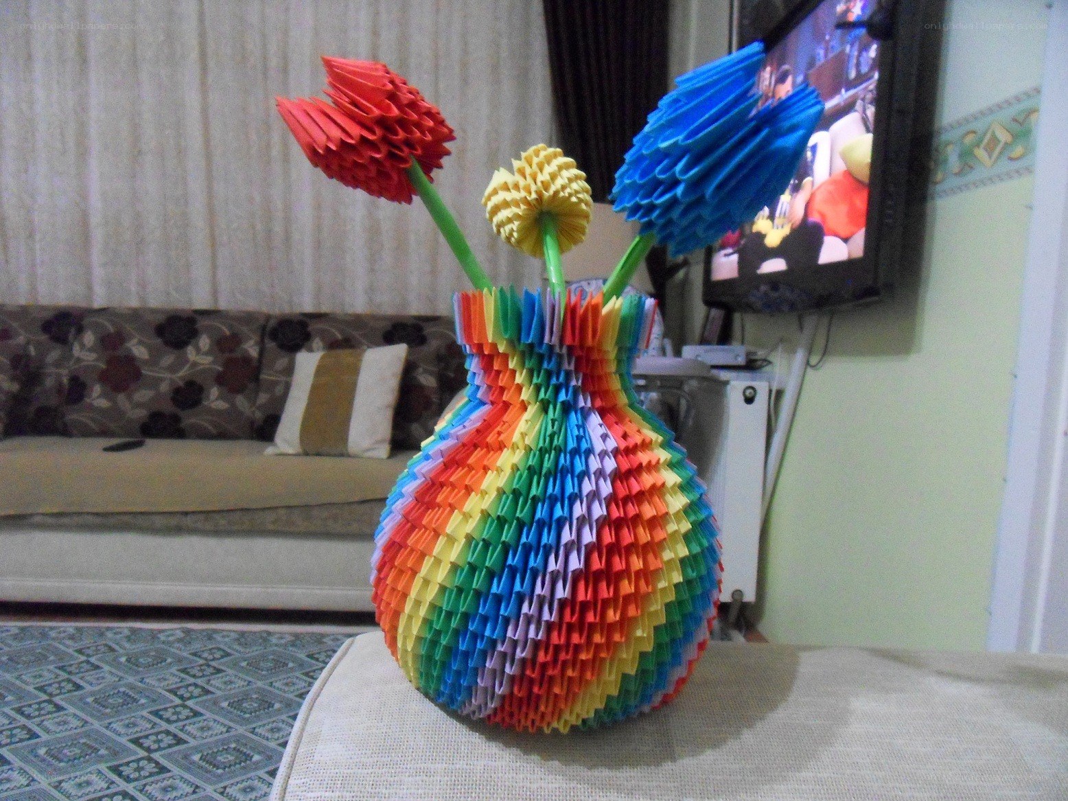 Origami flowers in a vase