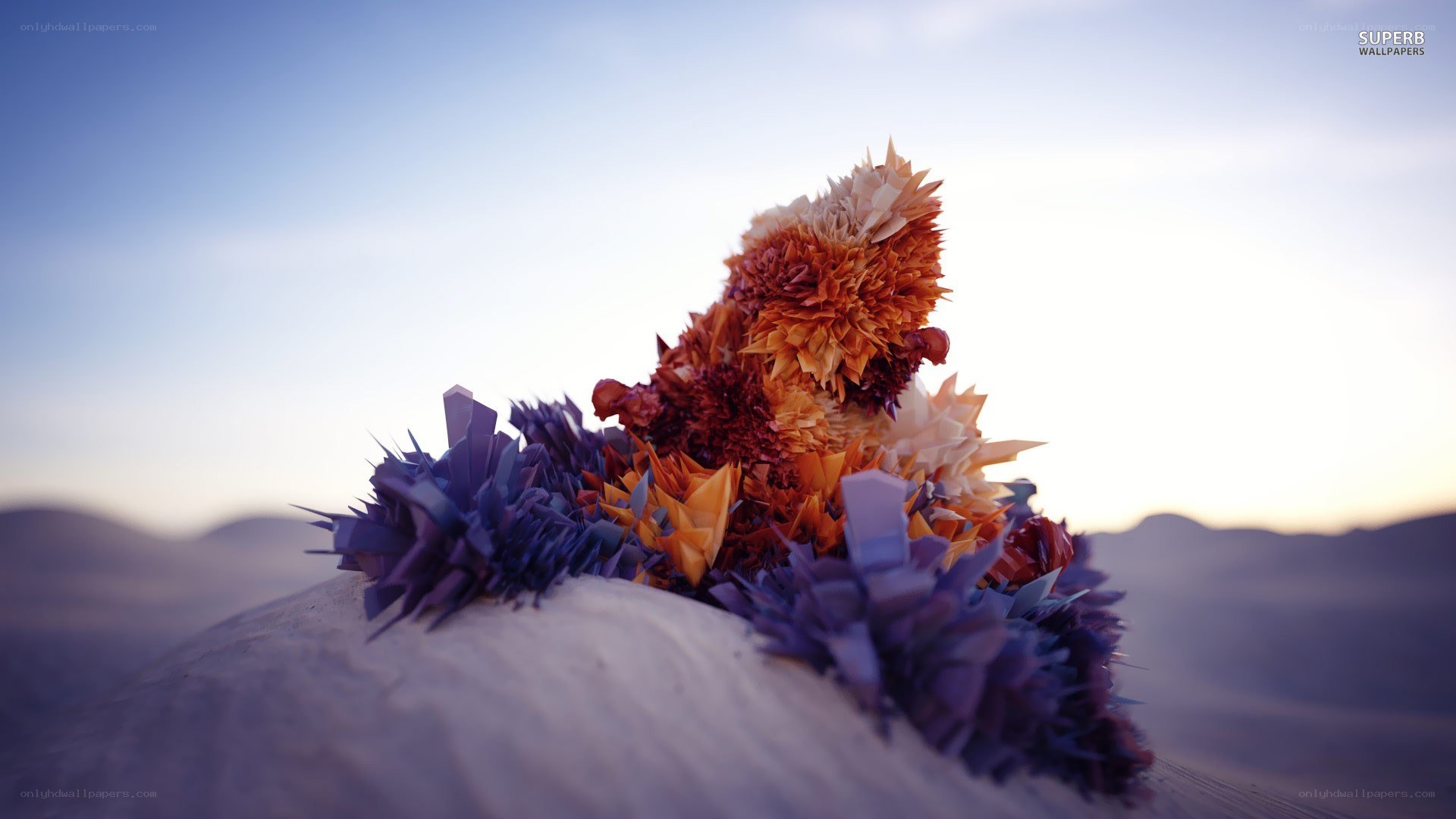 origami sculpture in desert