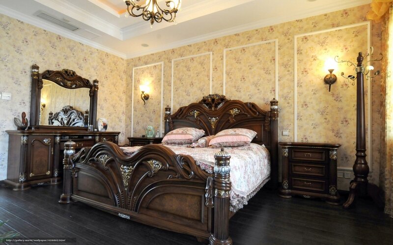 ornate bedroom with wooden furniture