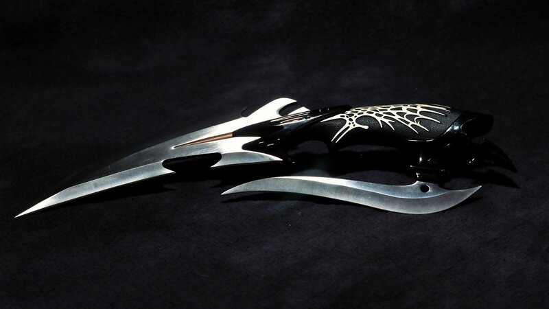 Ornate Black and Silver Daggers