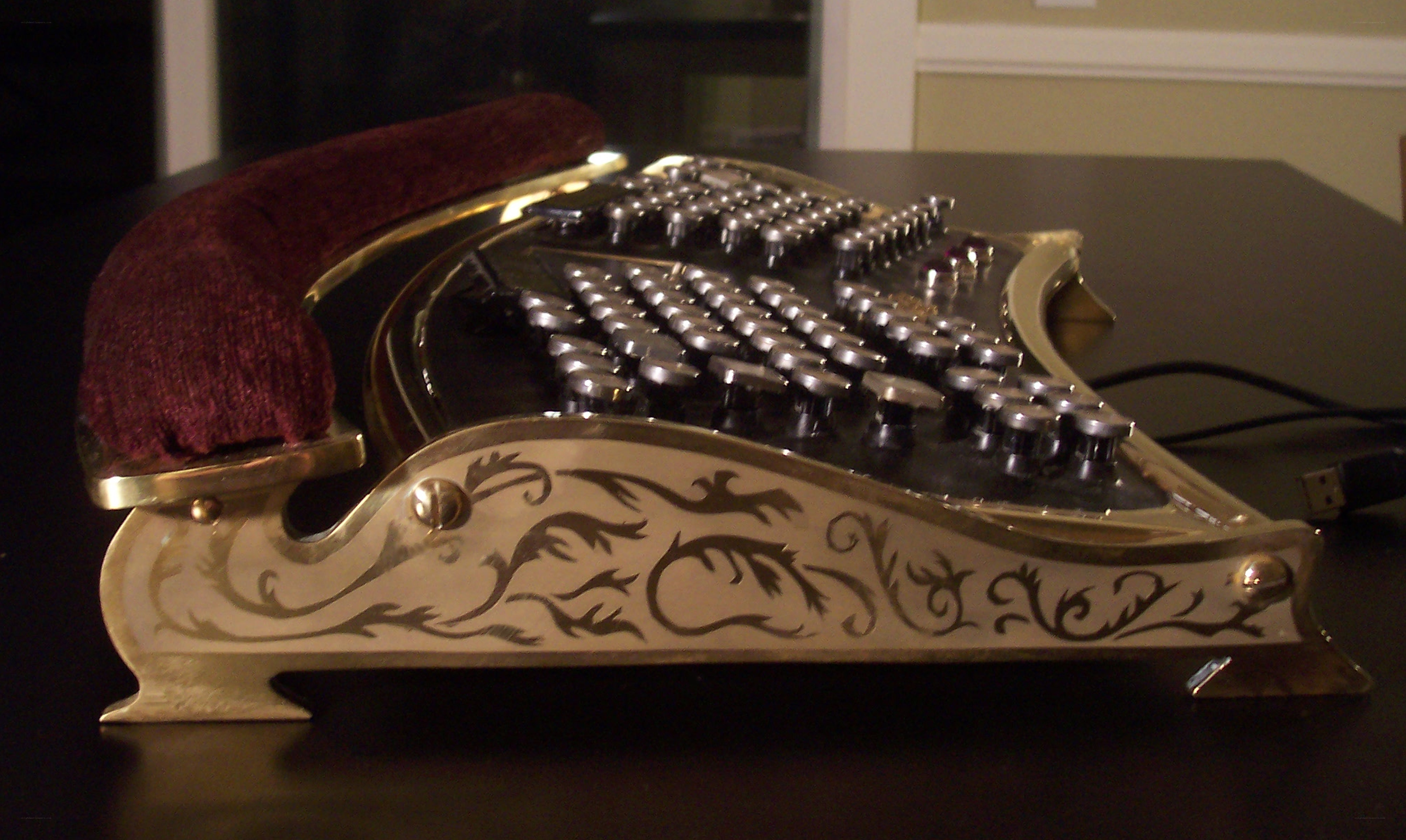 ornate brass typewriter