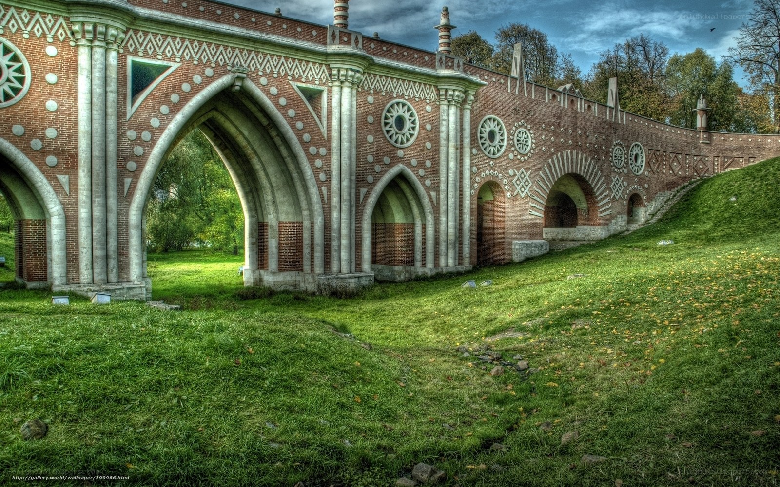 ornate brick bridge in park