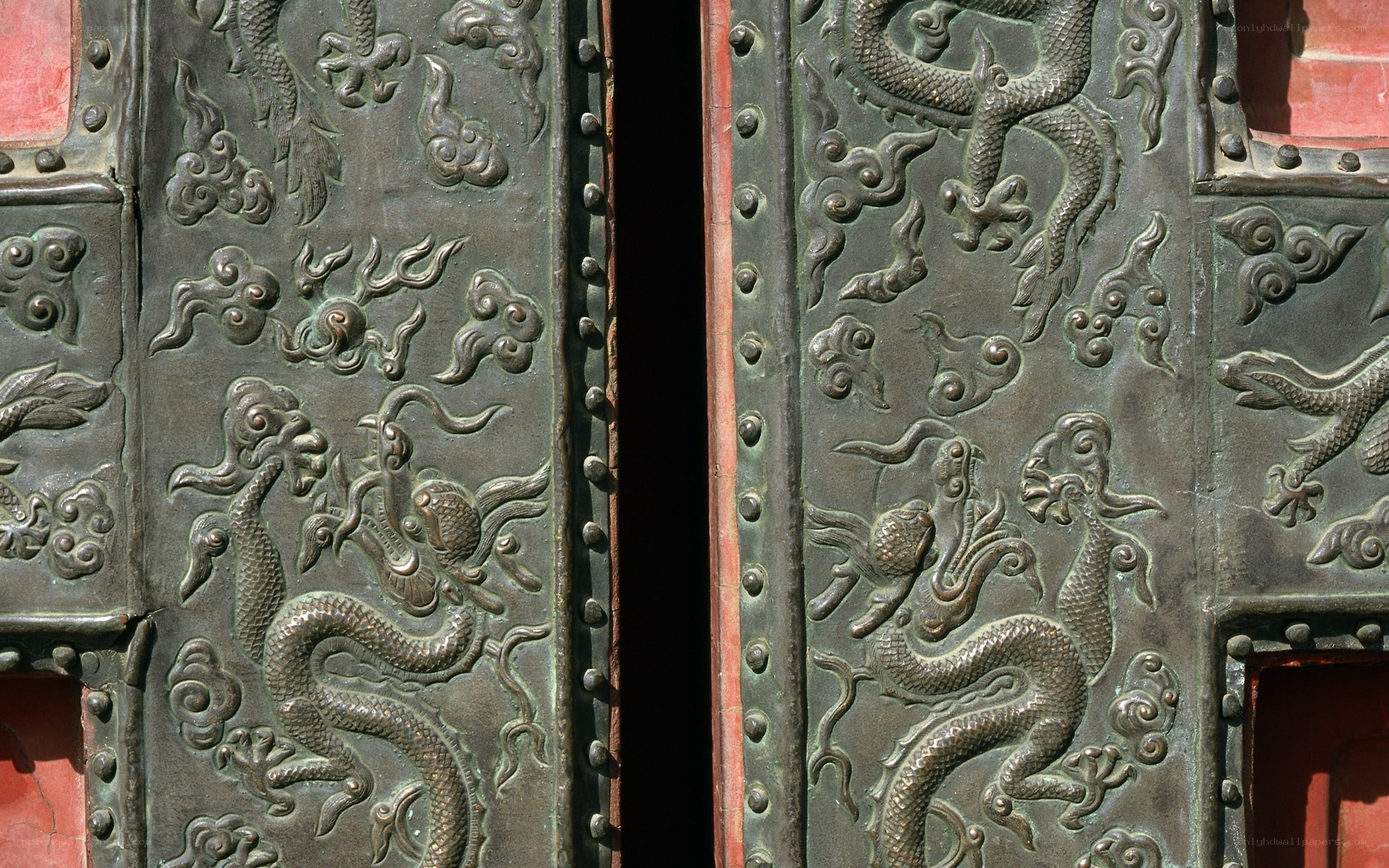 ornate bronze door with dragons
