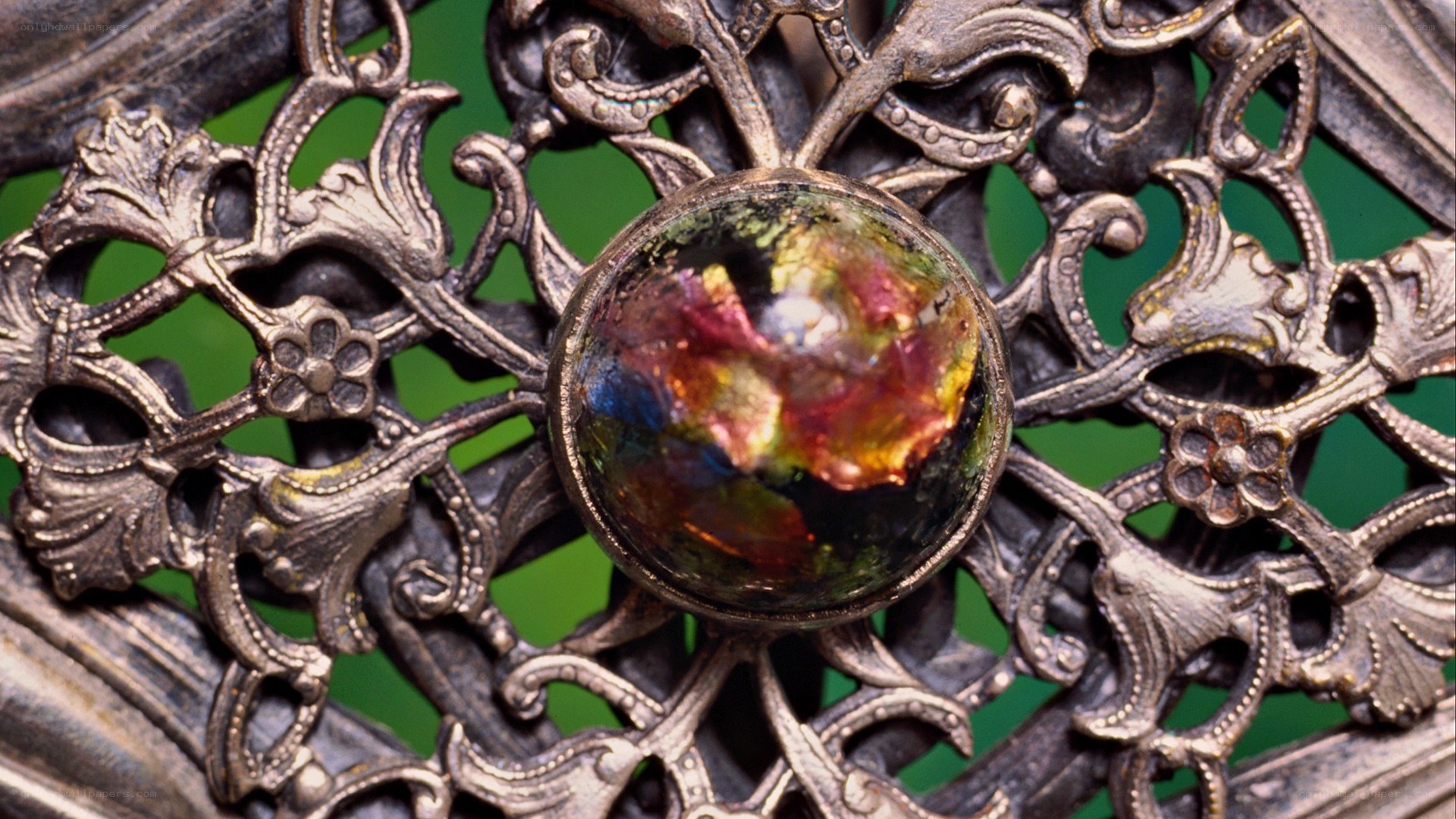 ornate brooch with gemstone