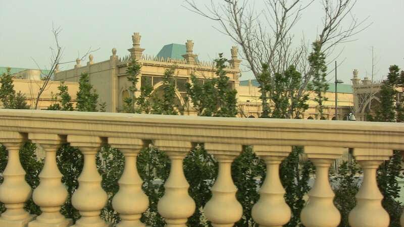 Ornate Building Behind Railing
