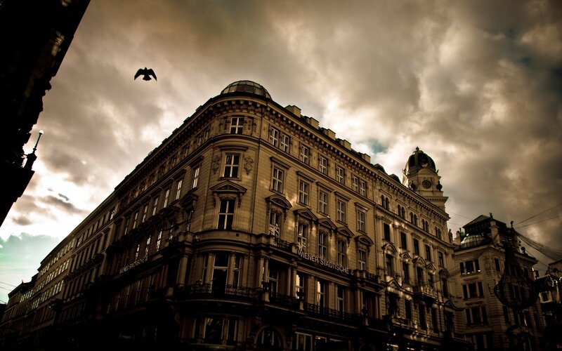 Ornate Building Corner — Brown