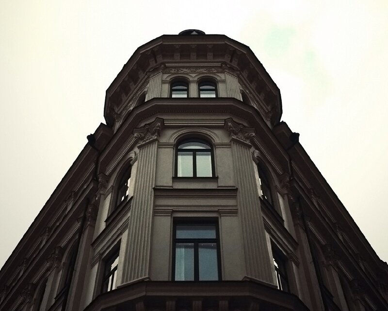 Ornate Building Corner — Gray, Dramatic