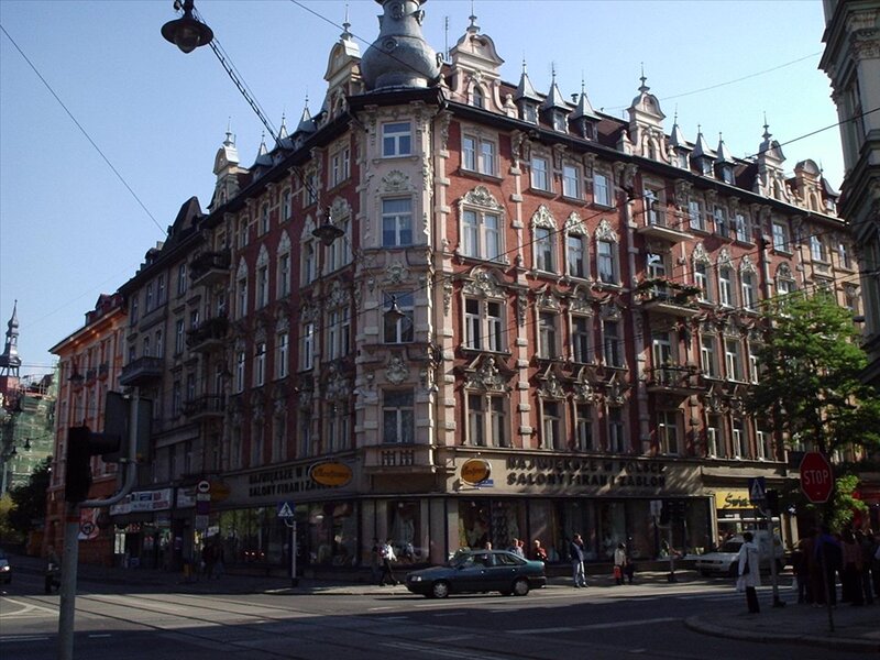 Ornate Building Corner — Red