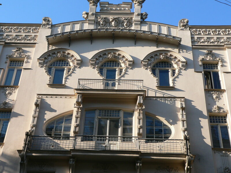 Ornate Building Facade — Beige, Dramatic, Afternoon, Photograph, Windows