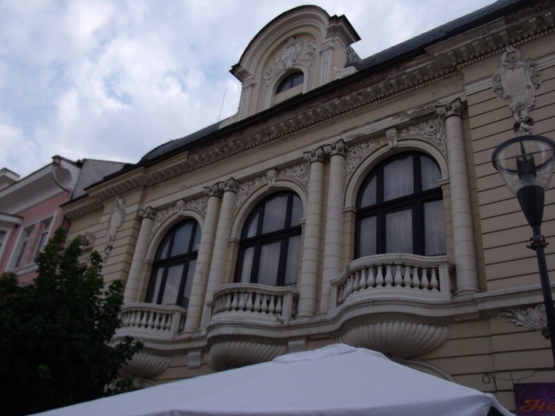 Ornate Building Facade — Beige, Dramatic