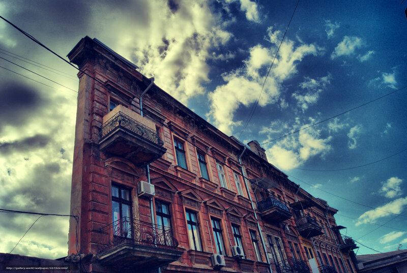 Ornate Building Facade — Blue, Dramatic, Afternoon, Photograph