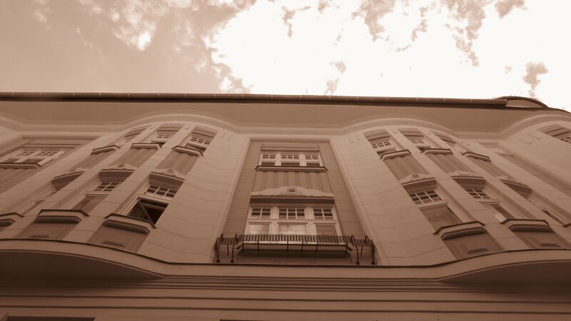 Ornate Building Facade — Brown, Dramatic