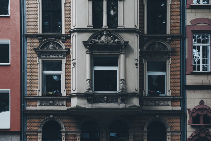Ornate Building Facade — Gray, Dramatic, Photograph