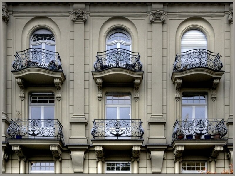 ornate building facade with balconies