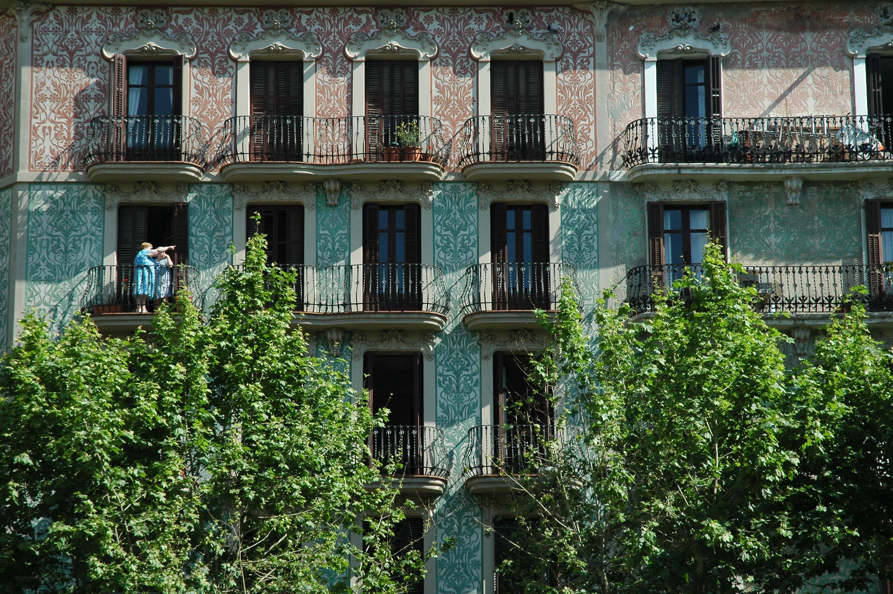 ornate building facade with balconies