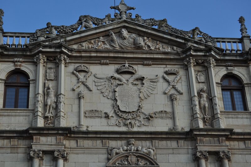 ornate building facade with coat of arms