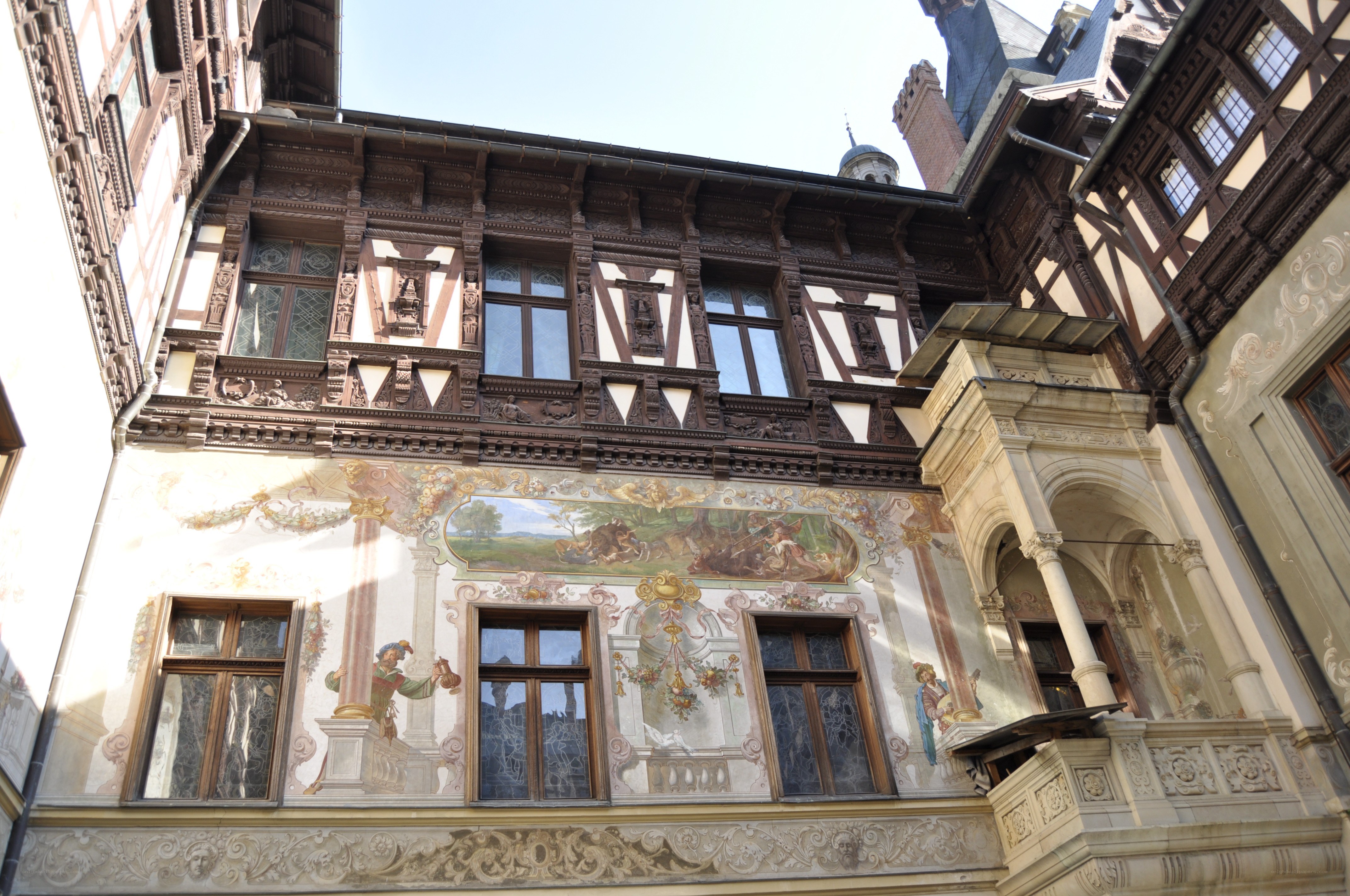 ornate building facade with frescoes