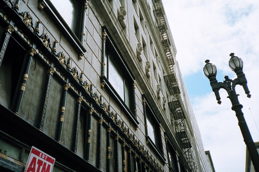 ornate building facade with street lamp