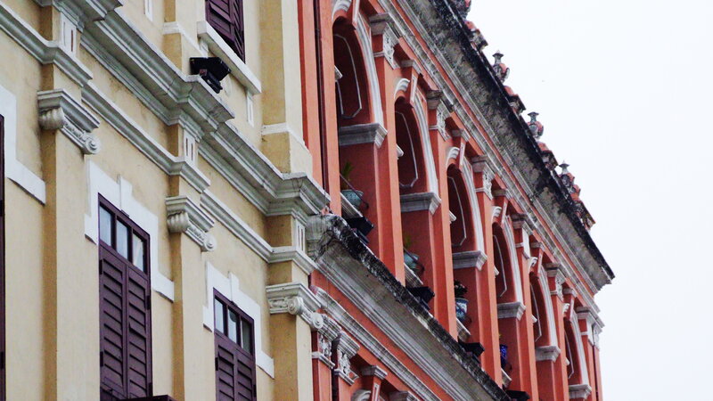 Ornate Building Facade — Yellow