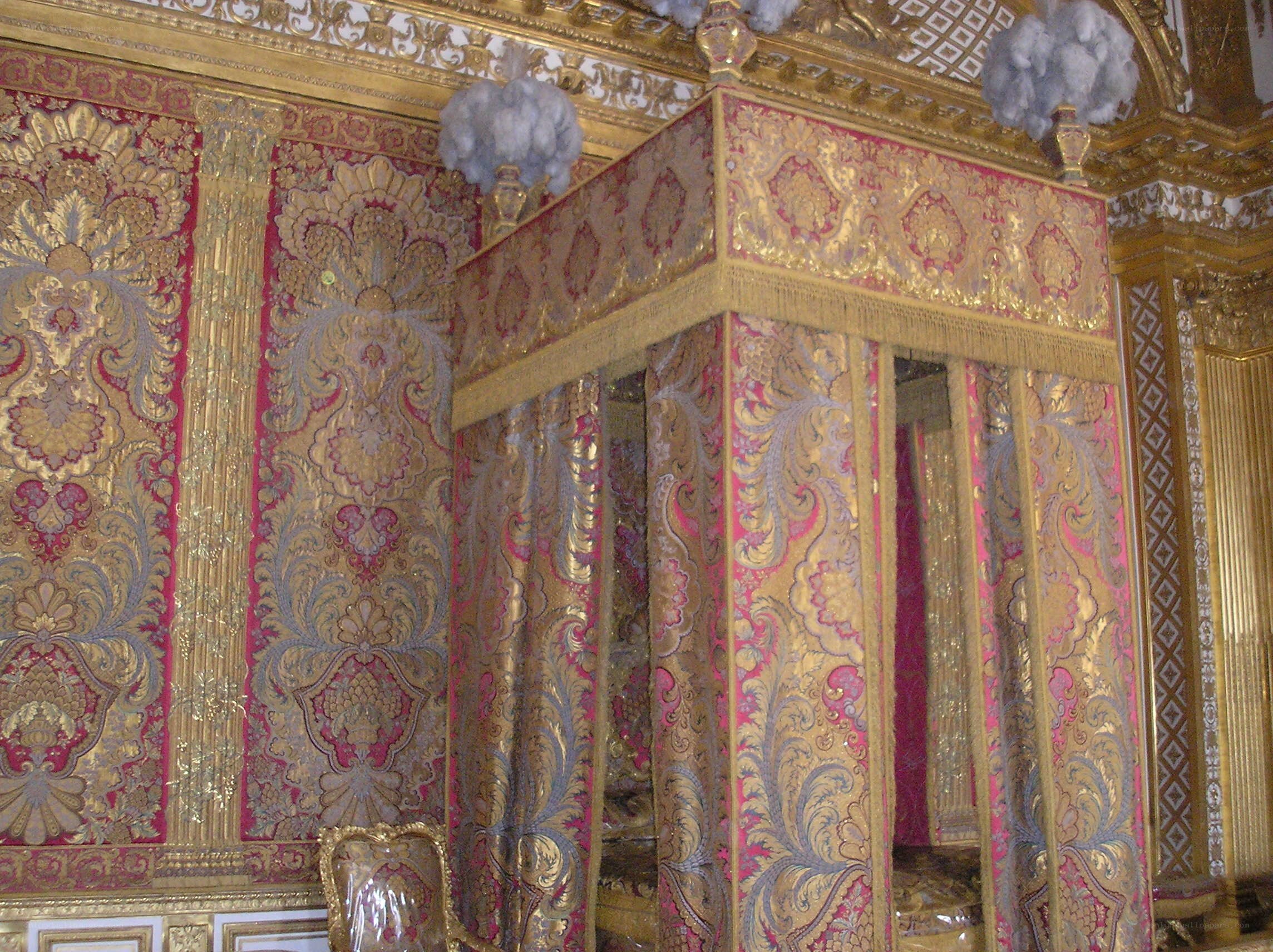ornate canopy bed in palace