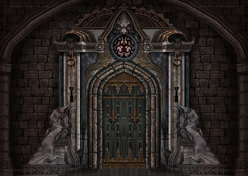 ornate castle gate with statues