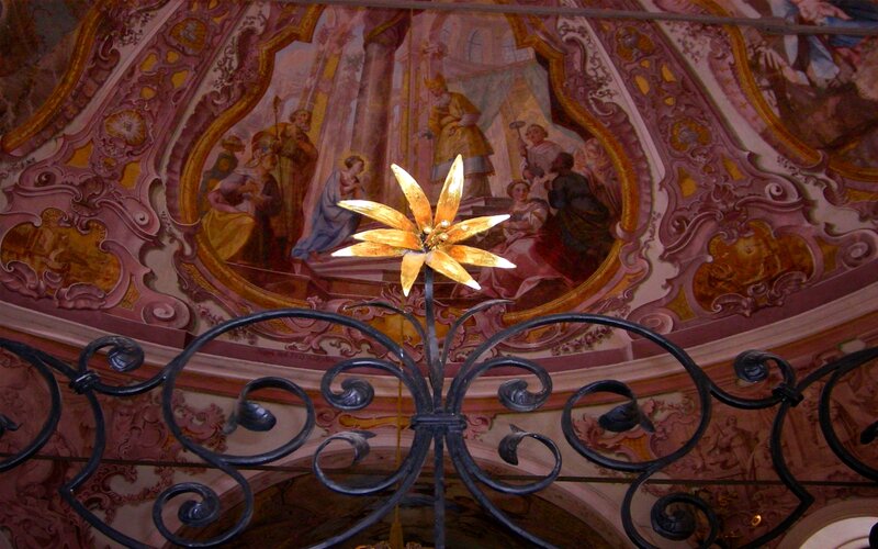 ornate ceiling fresco with golden flower