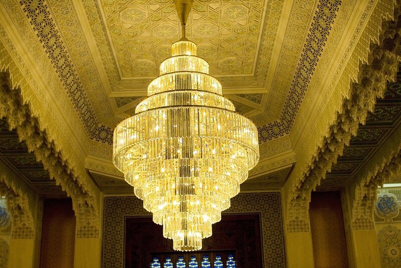Ornate chandelier in a decorated hall