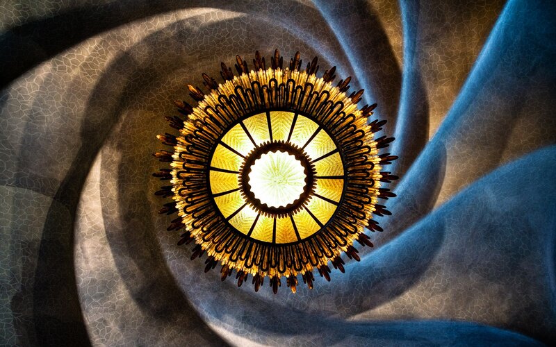 Ornate chandelier in a spiral tunnel