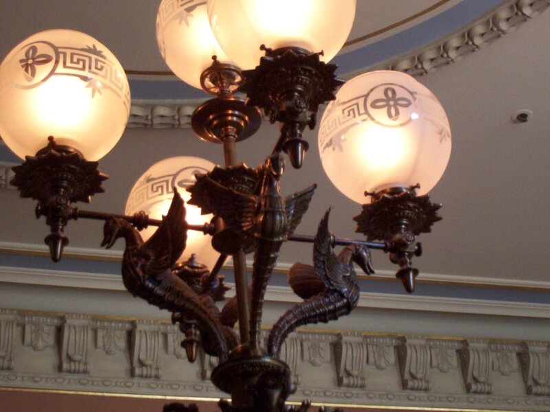 ornate chandelier with glass globes