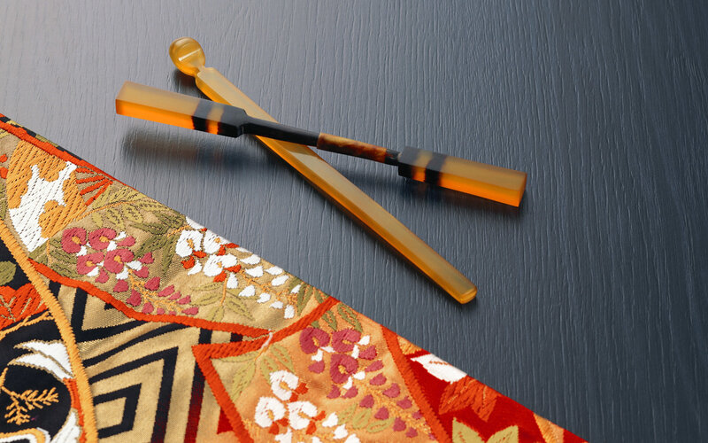 Ornate Chopsticks and Fabric