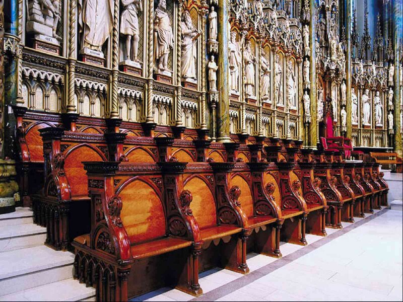 Ornate church pews and statues