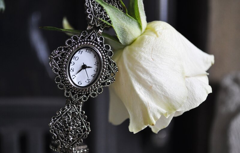 Ornate Clock with White Rose