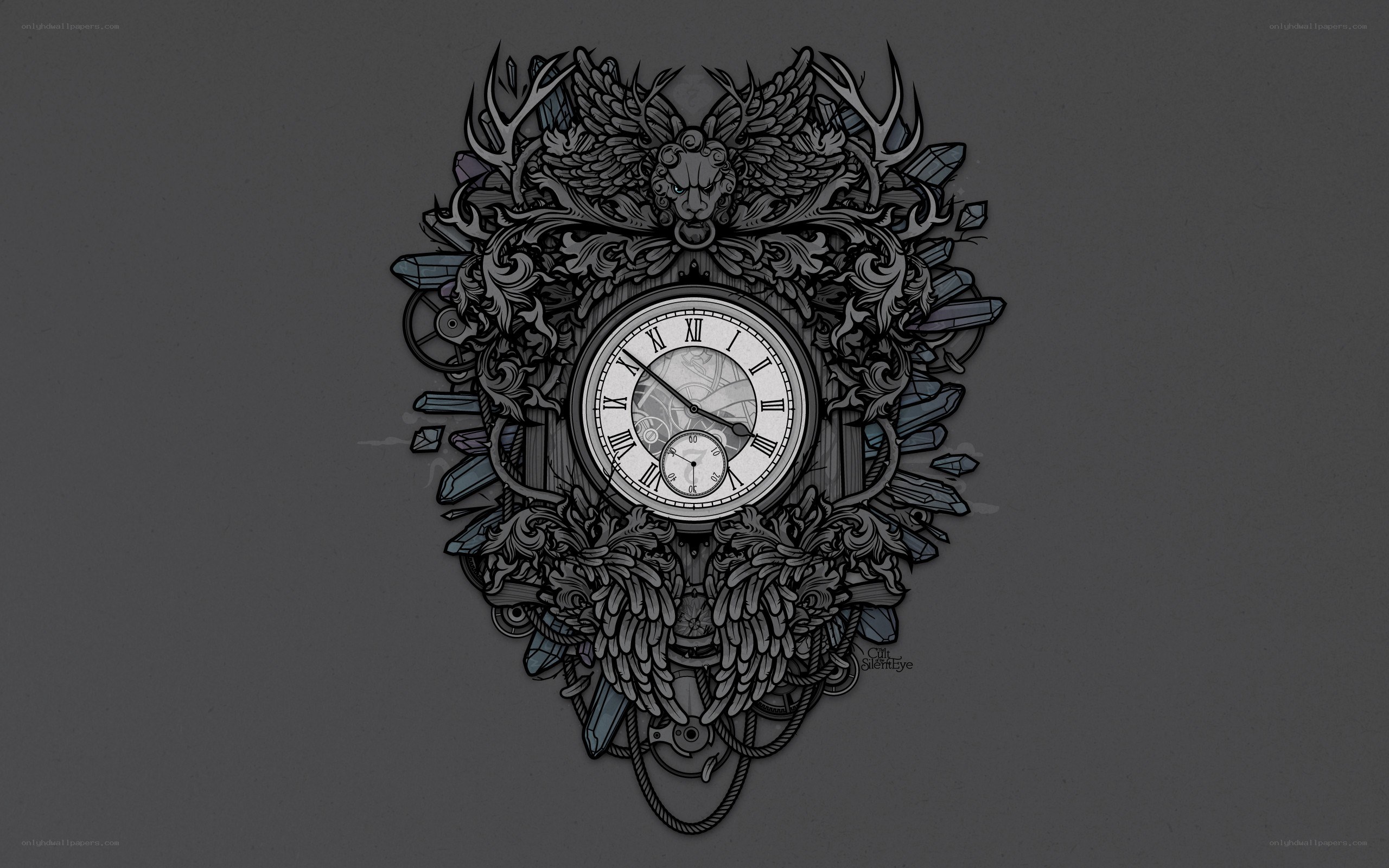 ornate clock with wings and crystals