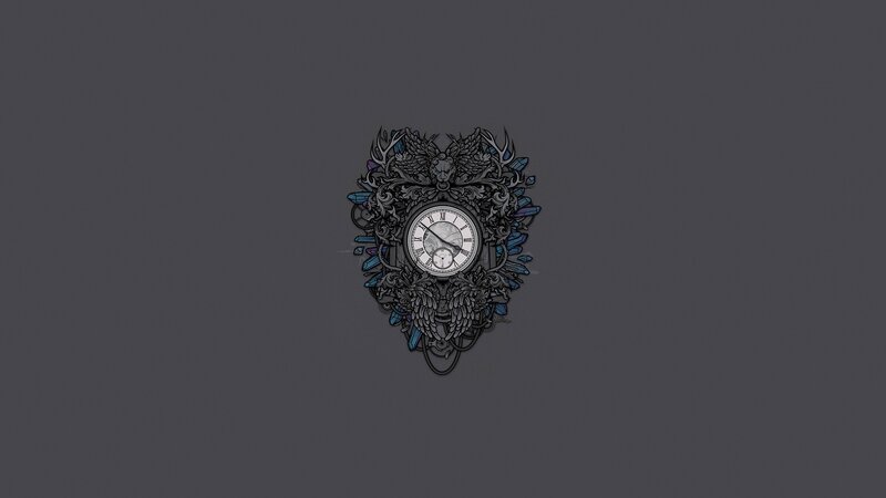 ornate clock with wings and crystals