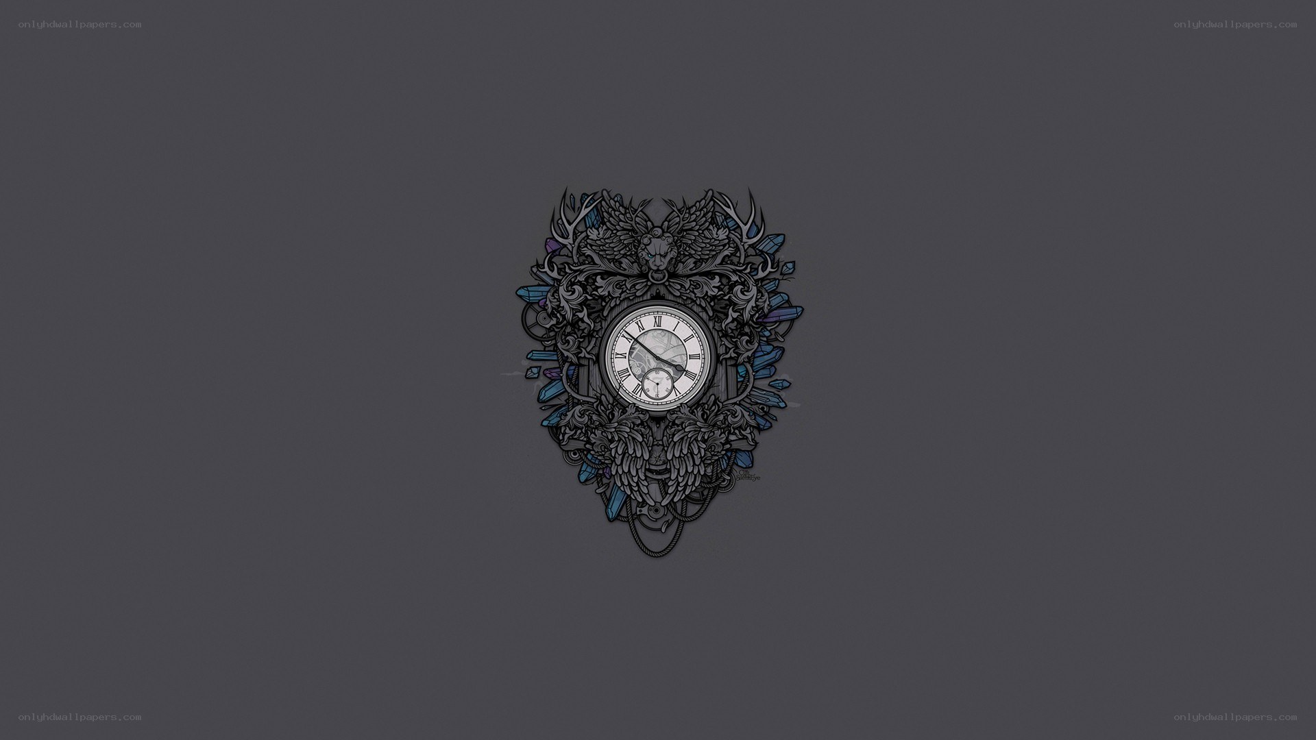 ornate clock with wings and crystals