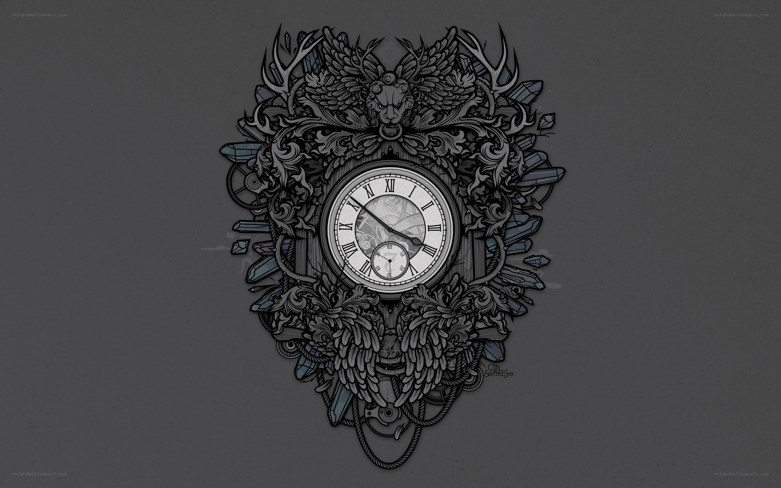 ornate clock with wings and crystals