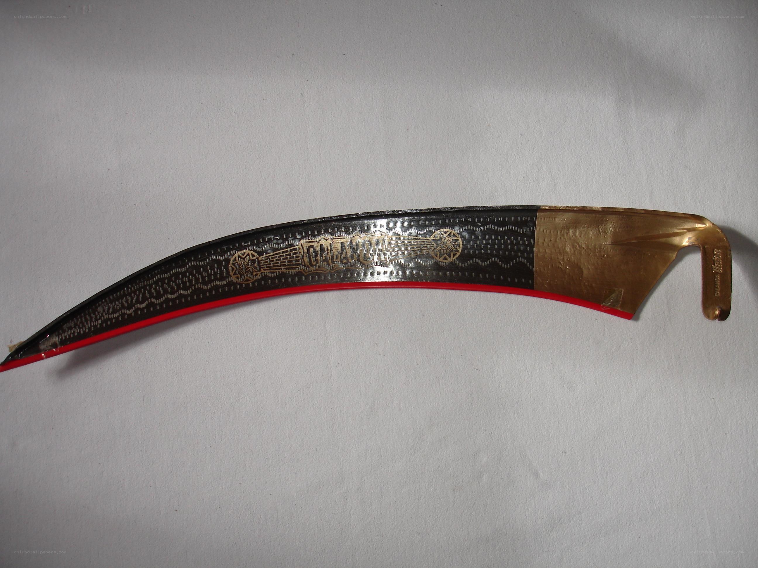 ornate curved blade knife