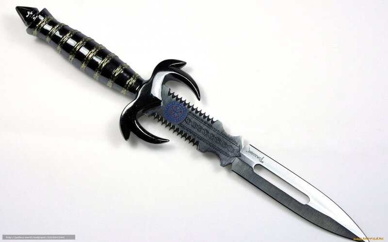 ornate dagger with black handle