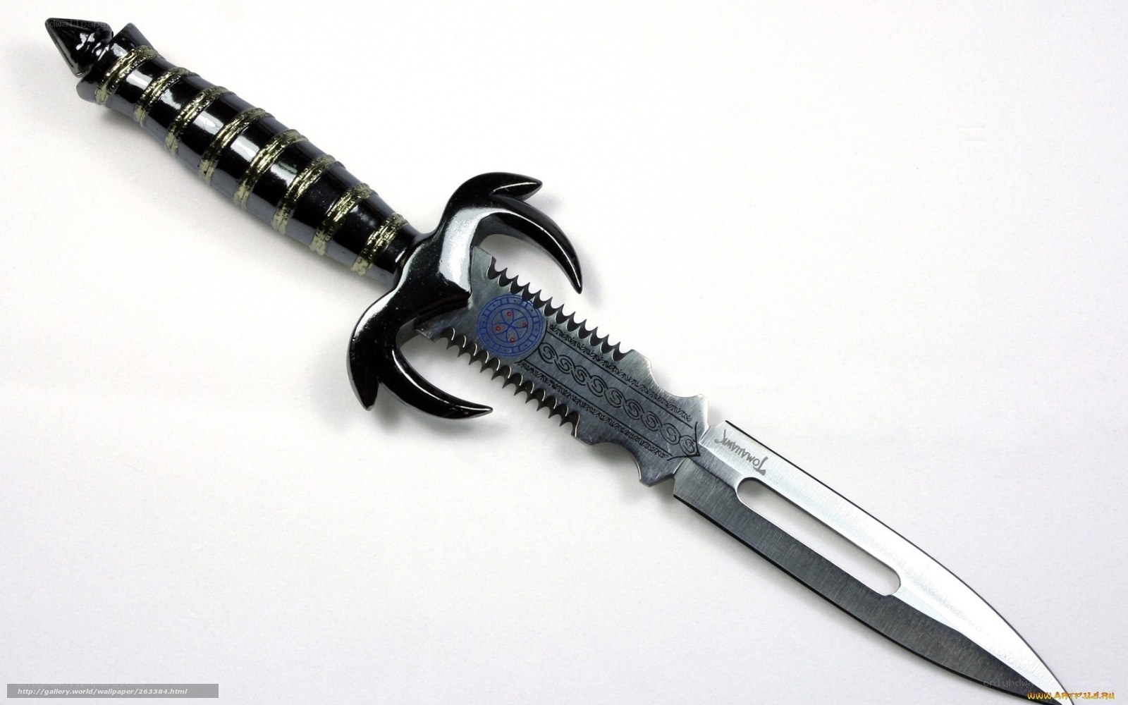 ornate dagger with black handle