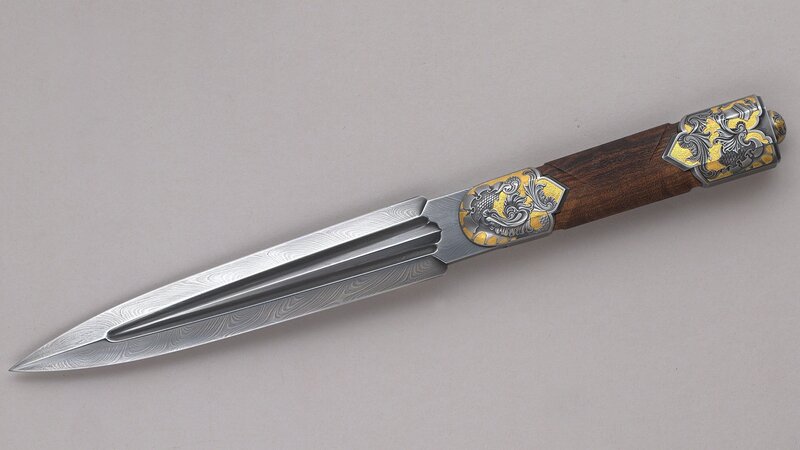 ornate dagger with damascus steel