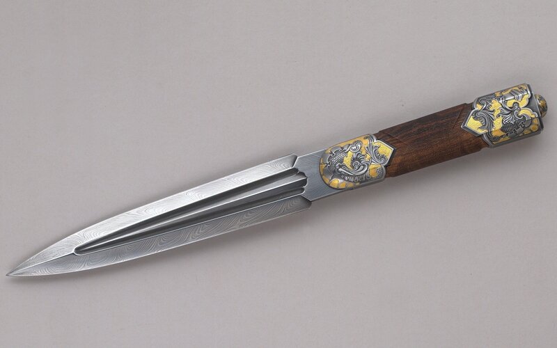 ornate dagger with damascus steel