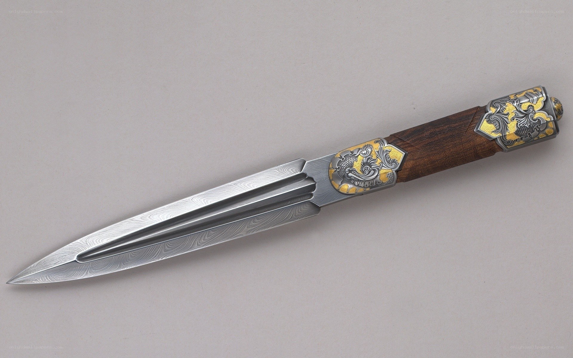 ornate dagger with damascus steel