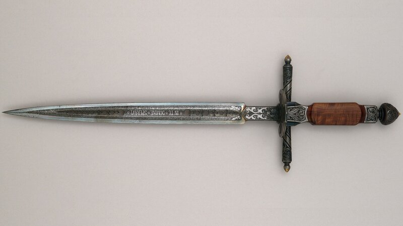 ornate dagger with inscription