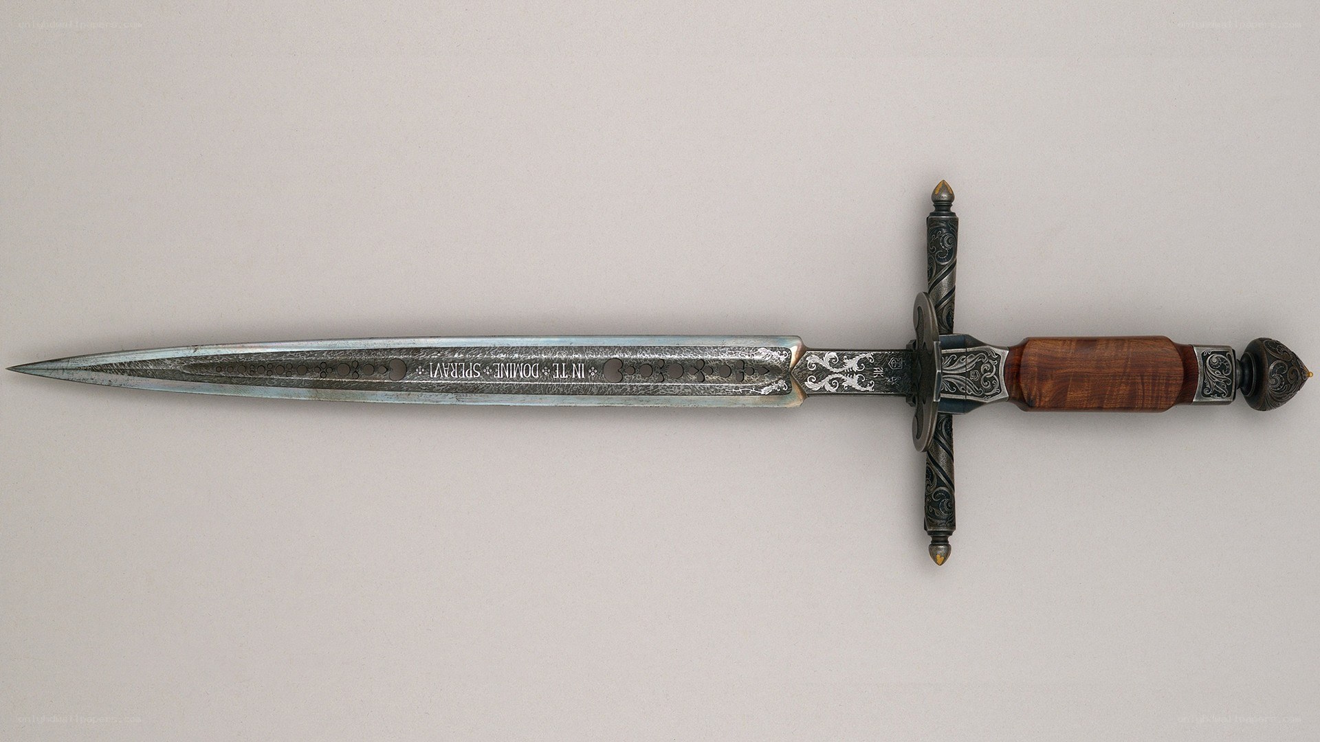 ornate dagger with inscription