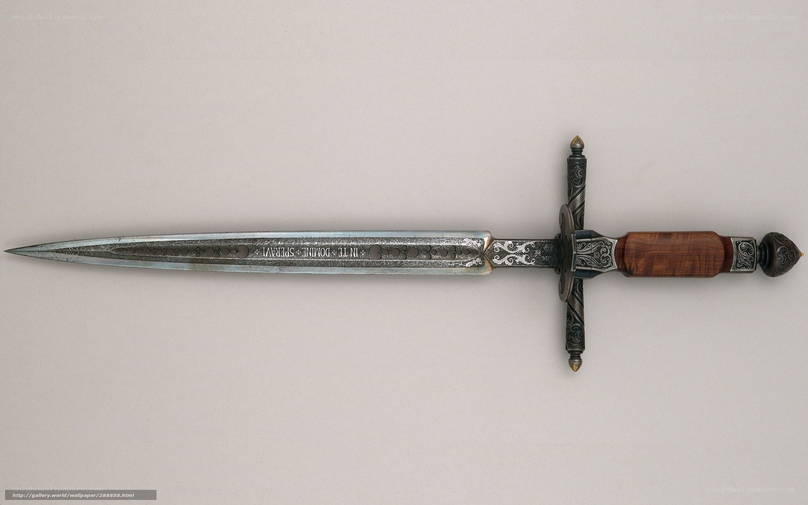 ornate dagger with inscription