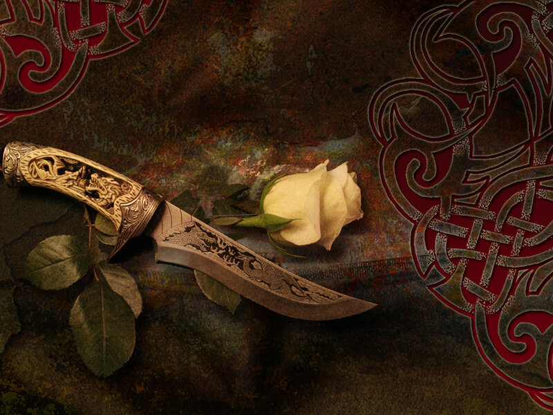 ornate dagger with rose